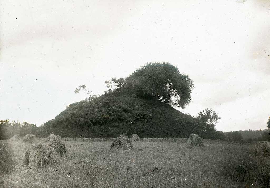  Photo shot of a burial mound from a native american tribe.
